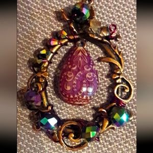 Antique brass filigree pendant with mood bead with oil slick Czech beads